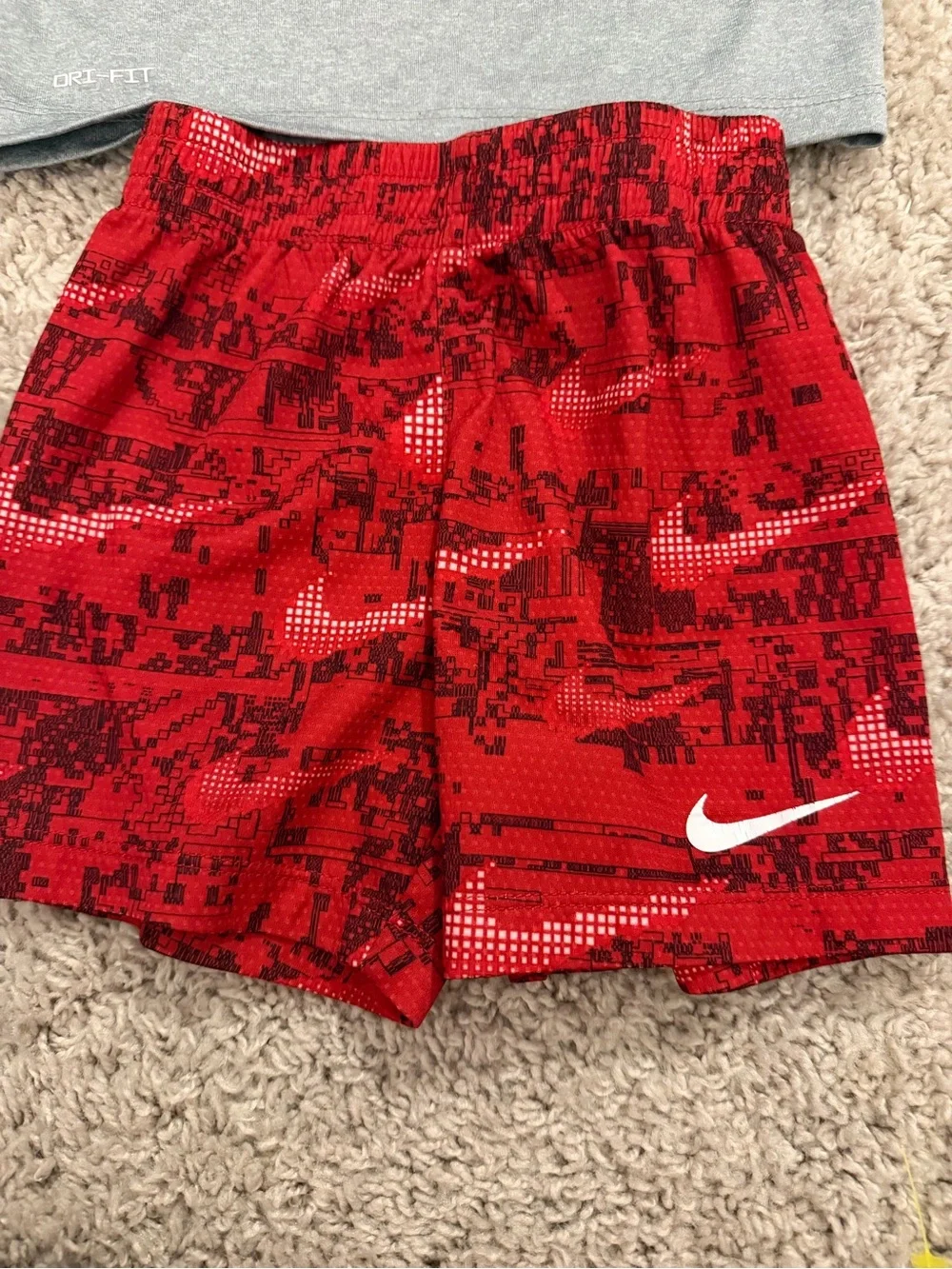 Nike Gray Tee with Black Logo and Red Patterned Shorts